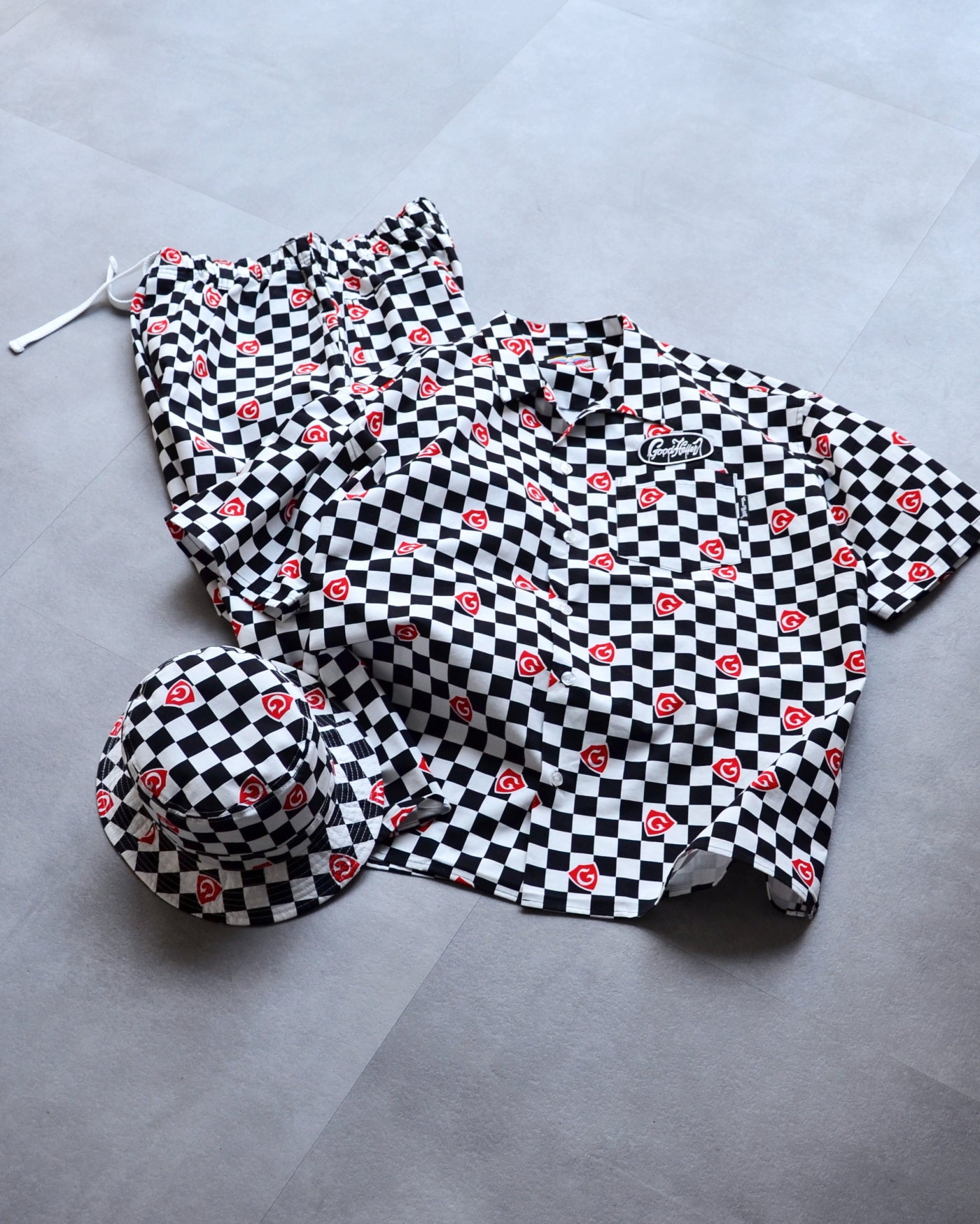GOOD HELLER | GH CHECKERED FLAG DRIPPING LOGO WAPPEN S/S SHIRT