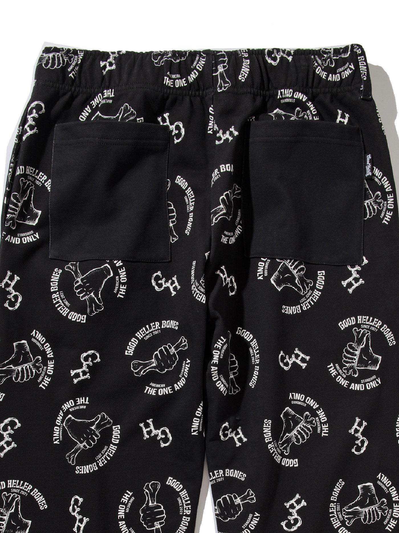 GOOD HELLER | BONE LOGO ALLOVER PATTERN SWEAT PANTS - Black