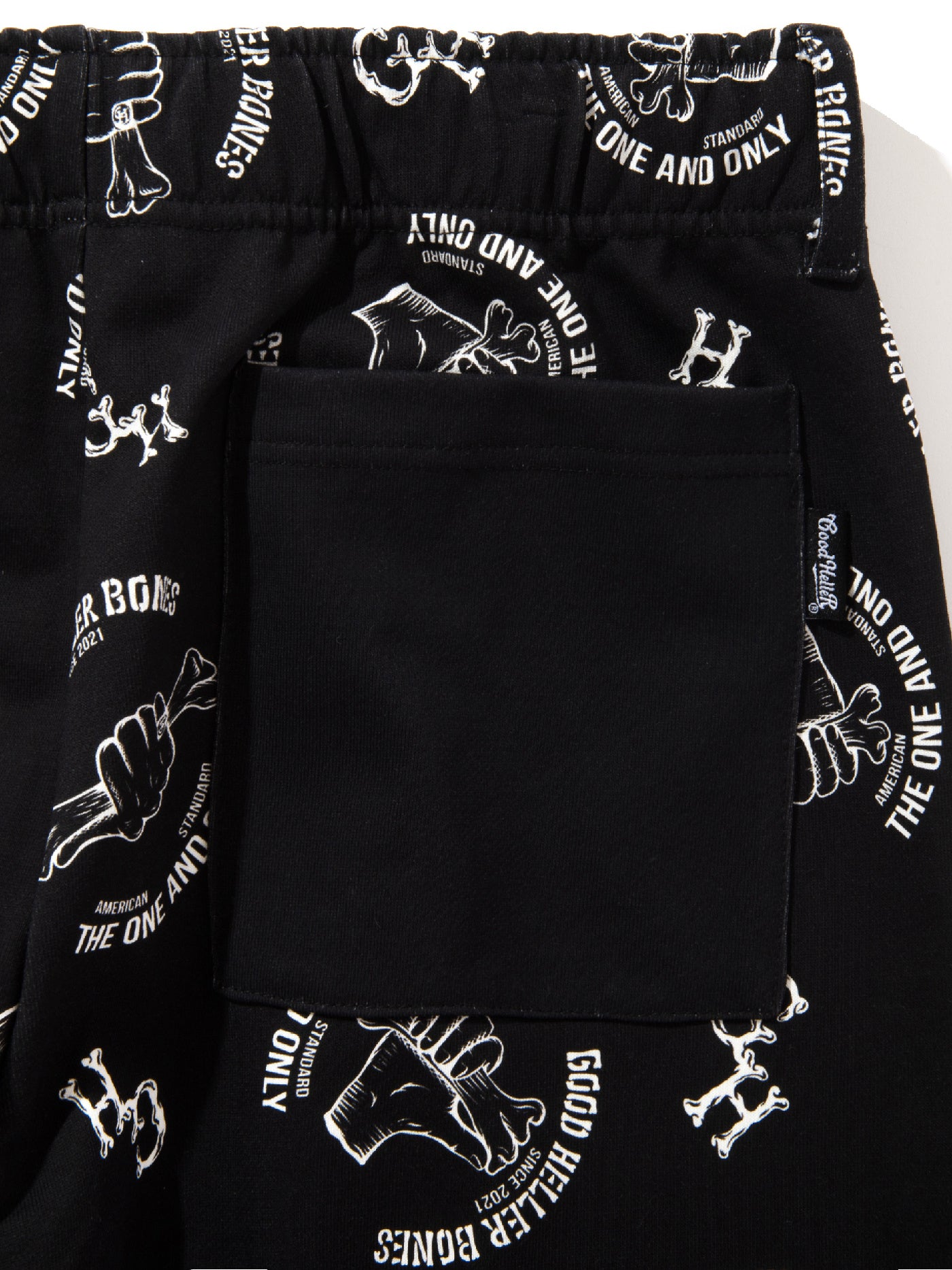GOOD HELLER | BONE LOGO ALLOVER PATTERN SWEAT PANTS - Black