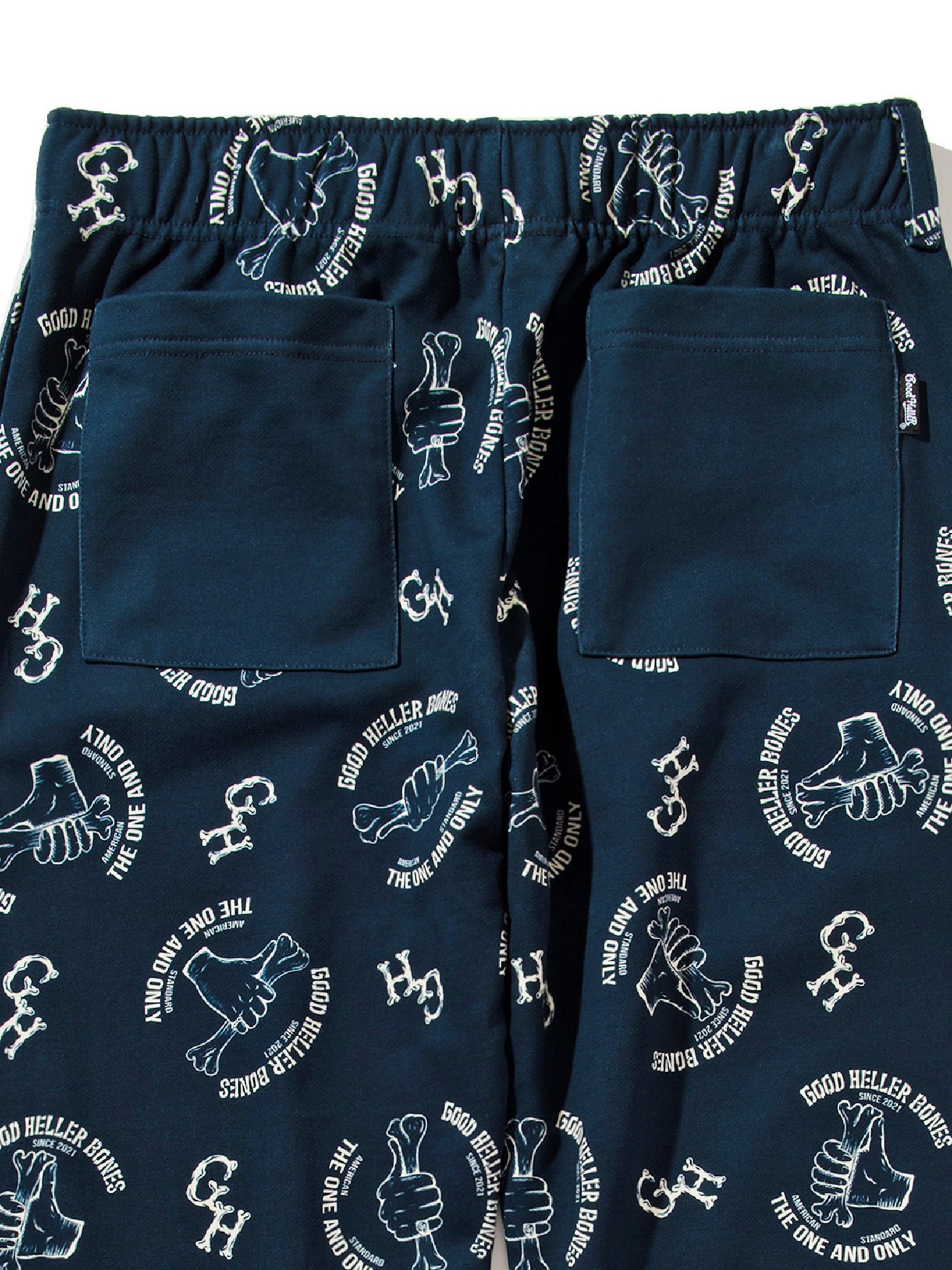 GOOD HELLER | BONE LOGO ALLOVER PATTERN SWEAT PANTS - Navy