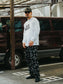 GOOD HELLER | BONE LOGO ALLOVER PATTERN SWEAT PANTS - Black