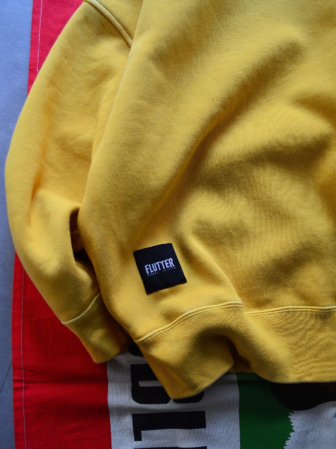 【2.25 (Tue) 12:00 Release】FLUTTER | Pigment Dye Origin logo B/S Sweat - Mustard