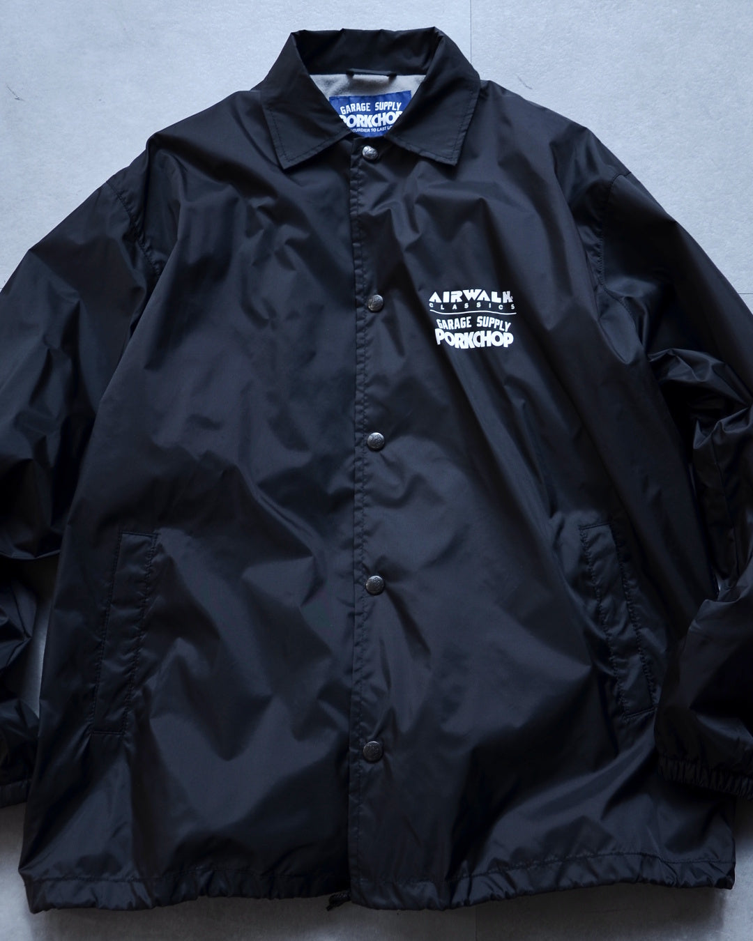 PORKCHOP | AP TRIANGLE COACH JKT - Black