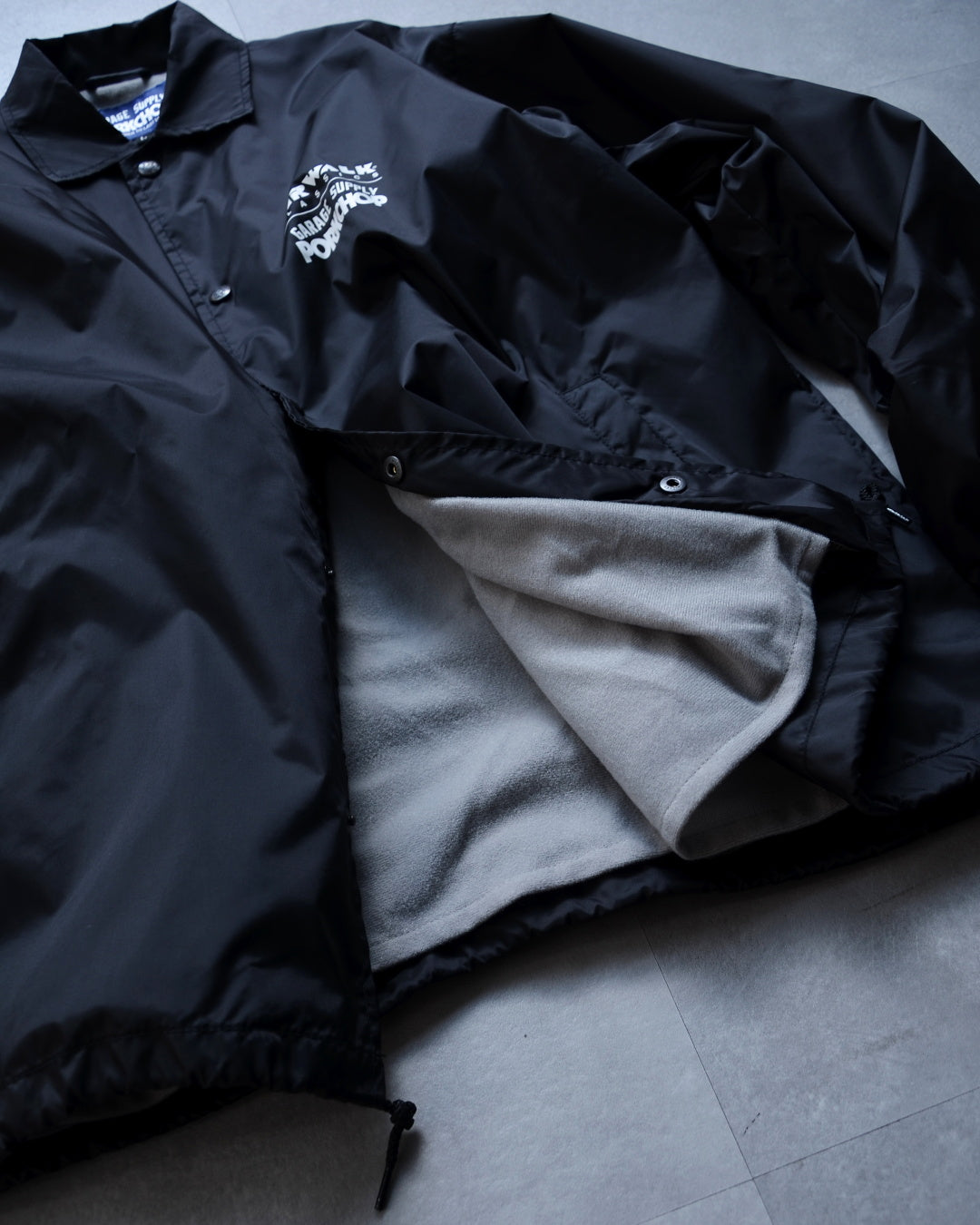 PORKCHOP | AP TRIANGLE COACH JKT - Black