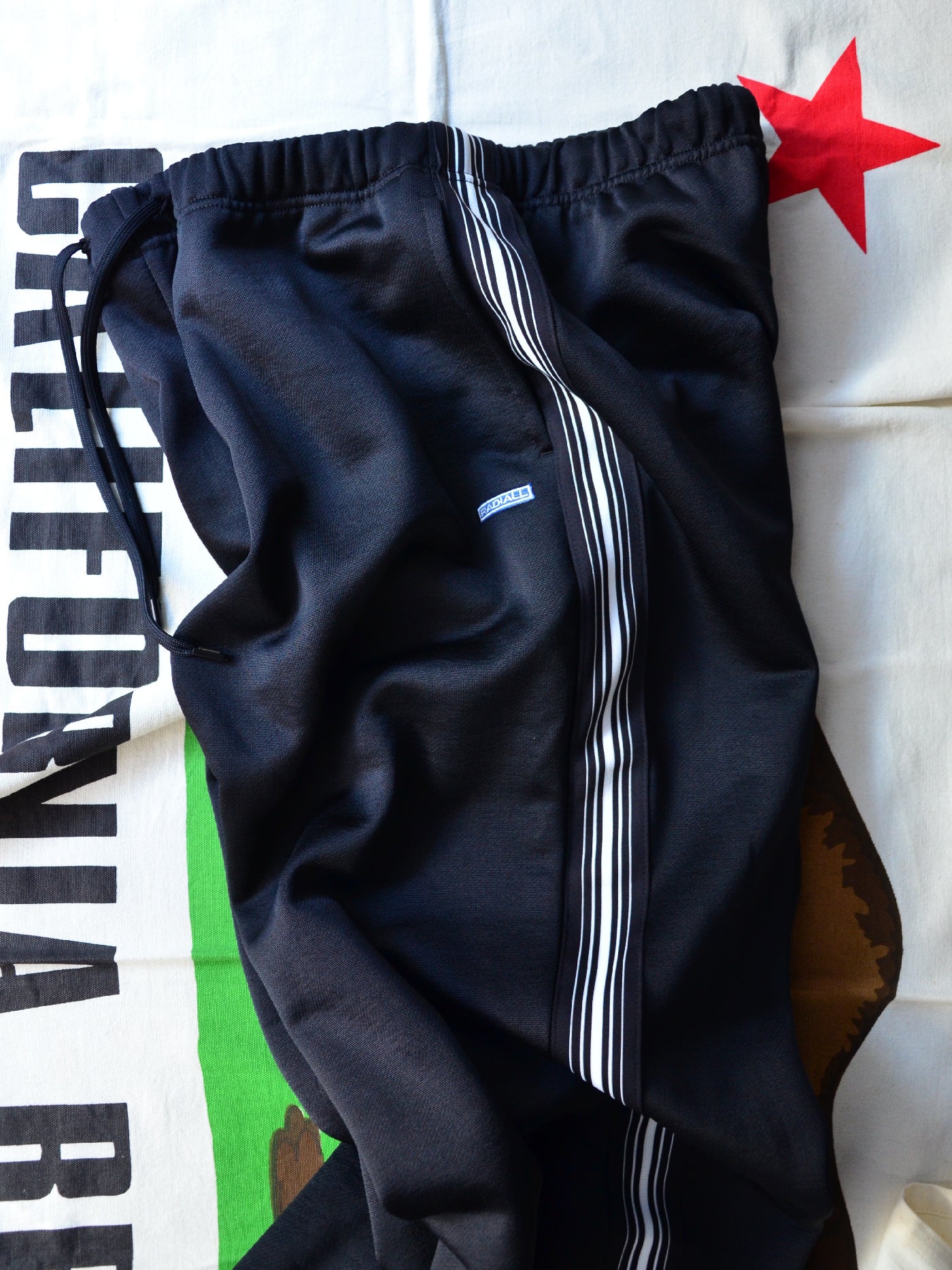 【11.1 (Sat) 12:00 Release】RADIALL | Root Down - WIDE FIT TRACK PANTS - Black