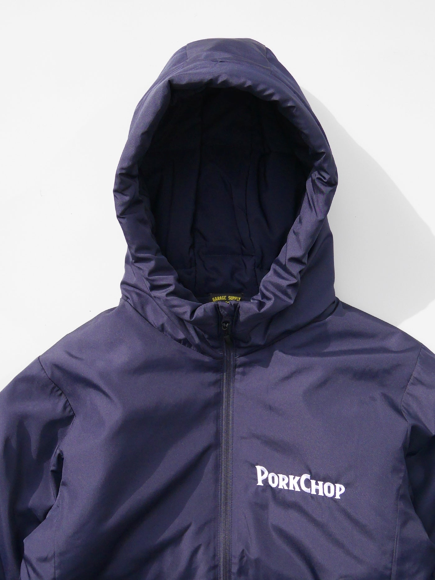 【12.28 (Sun) 12:00 Release】PORKCHOP | BURNING LOGO HOODED JKT - Navy