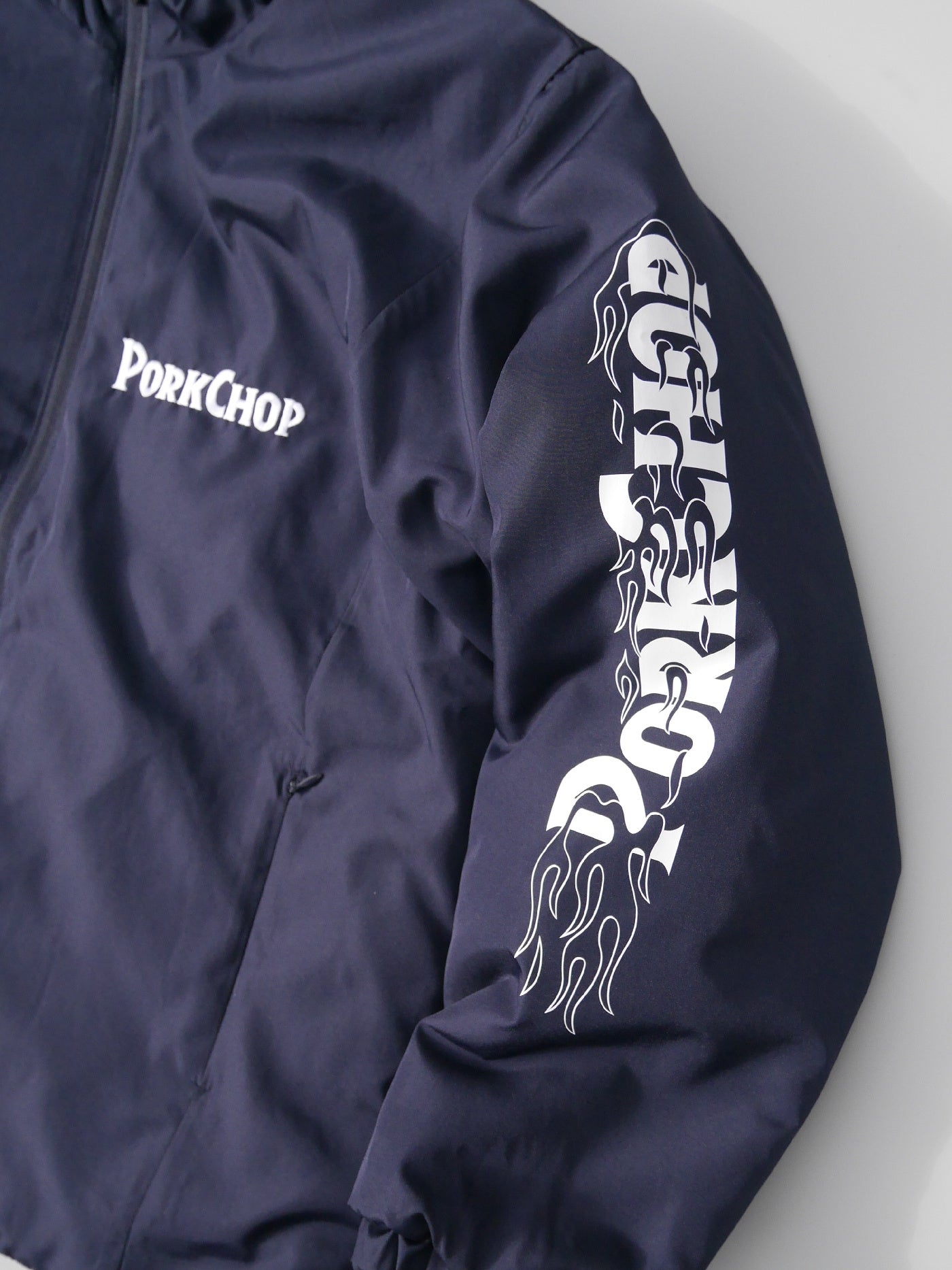 【12.28 (Sun) 12:00 Release】PORKCHOP | BURNING LOGO HOODED JKT - Navy